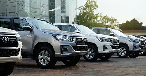 Bangkok, Thailand - May 13, 2018 :Row of New Pickup Trucks For Sale, Toyota Hilux Revo 2018 at showroom